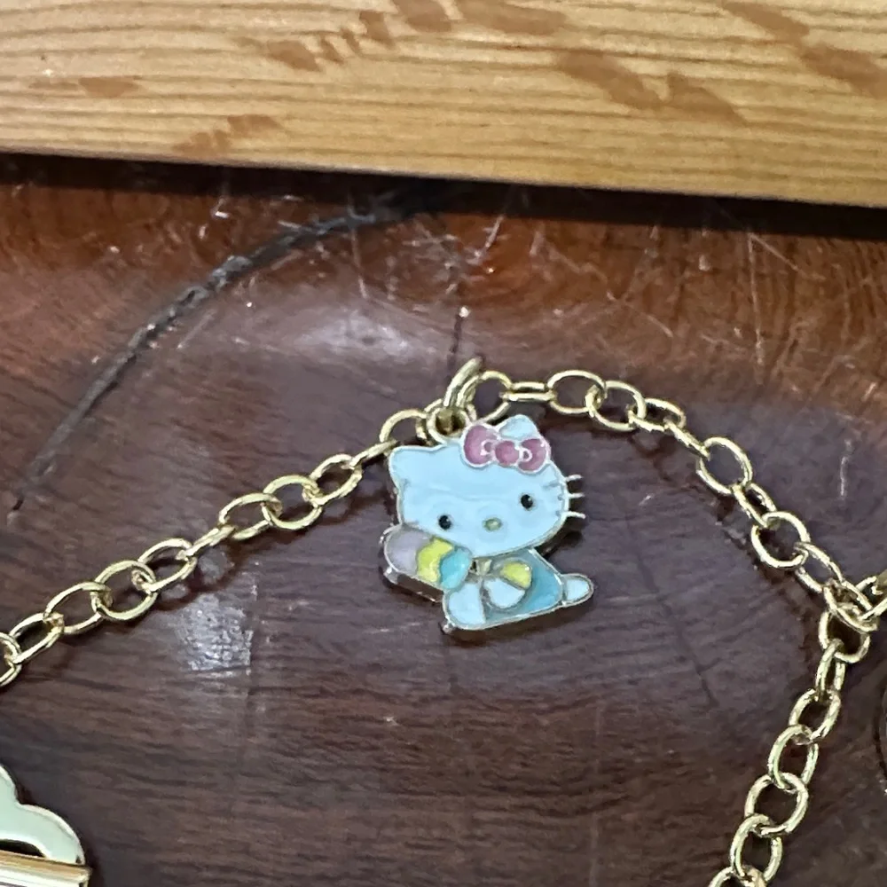 Hello Kitty Gold Bracelet with Pink and Rainbow Charms Heart Tiffany Clasp